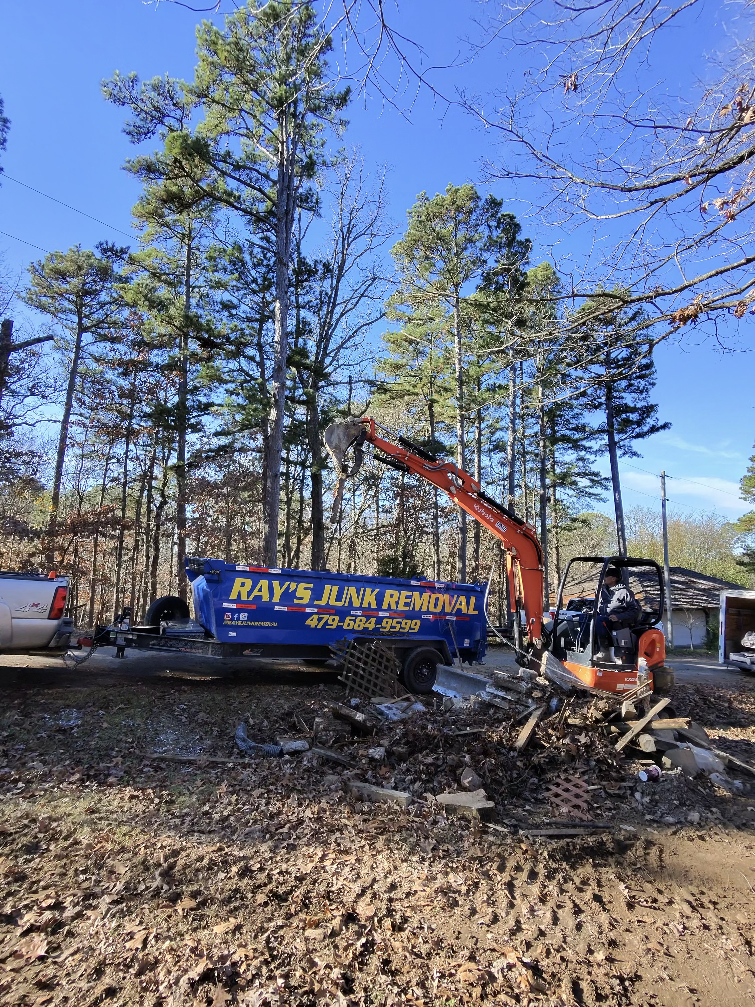 Mini Excavator Loading Pickup Truck