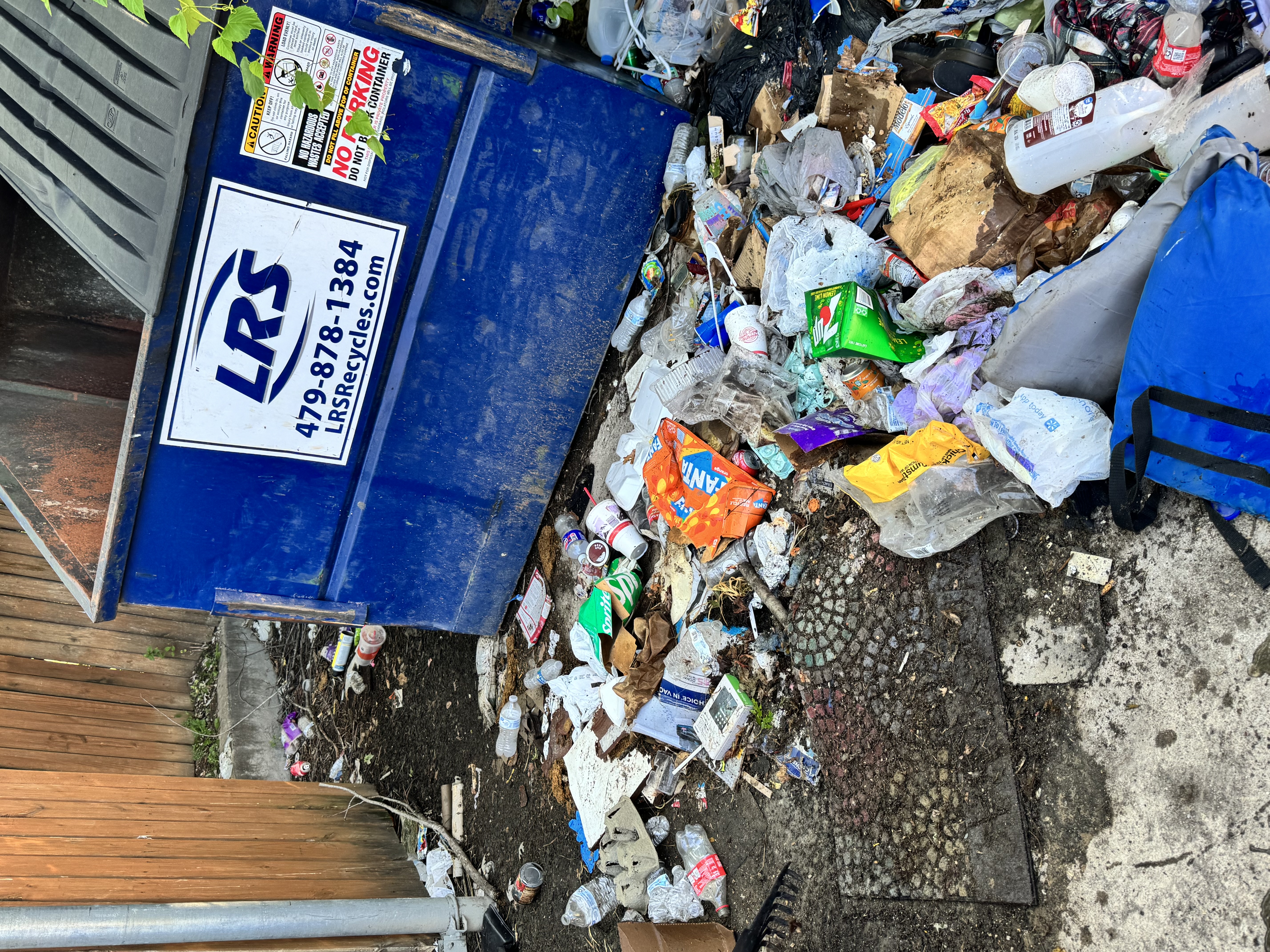 More Trash by Dumpster